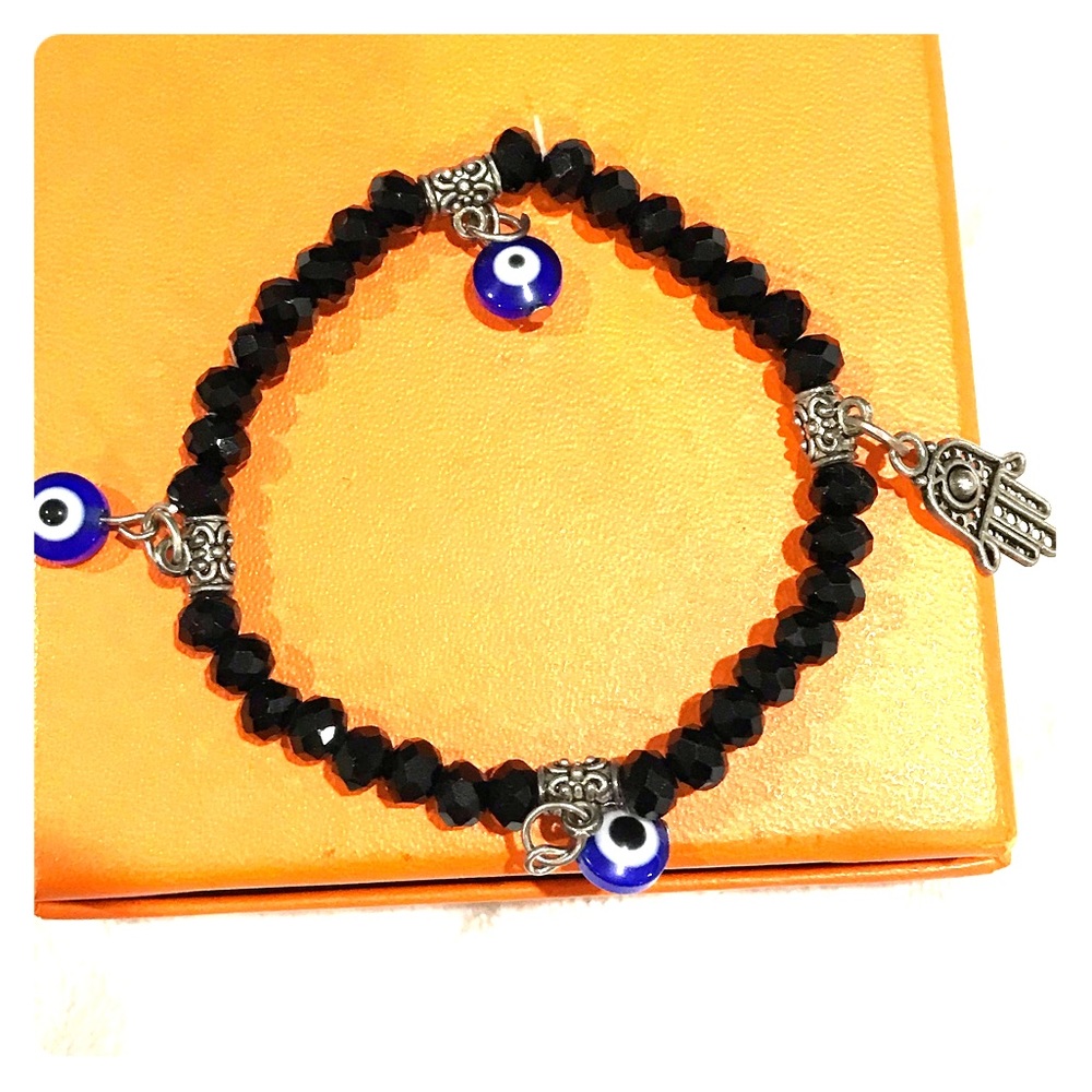 Evil eye and hamza protective hand bracelet
